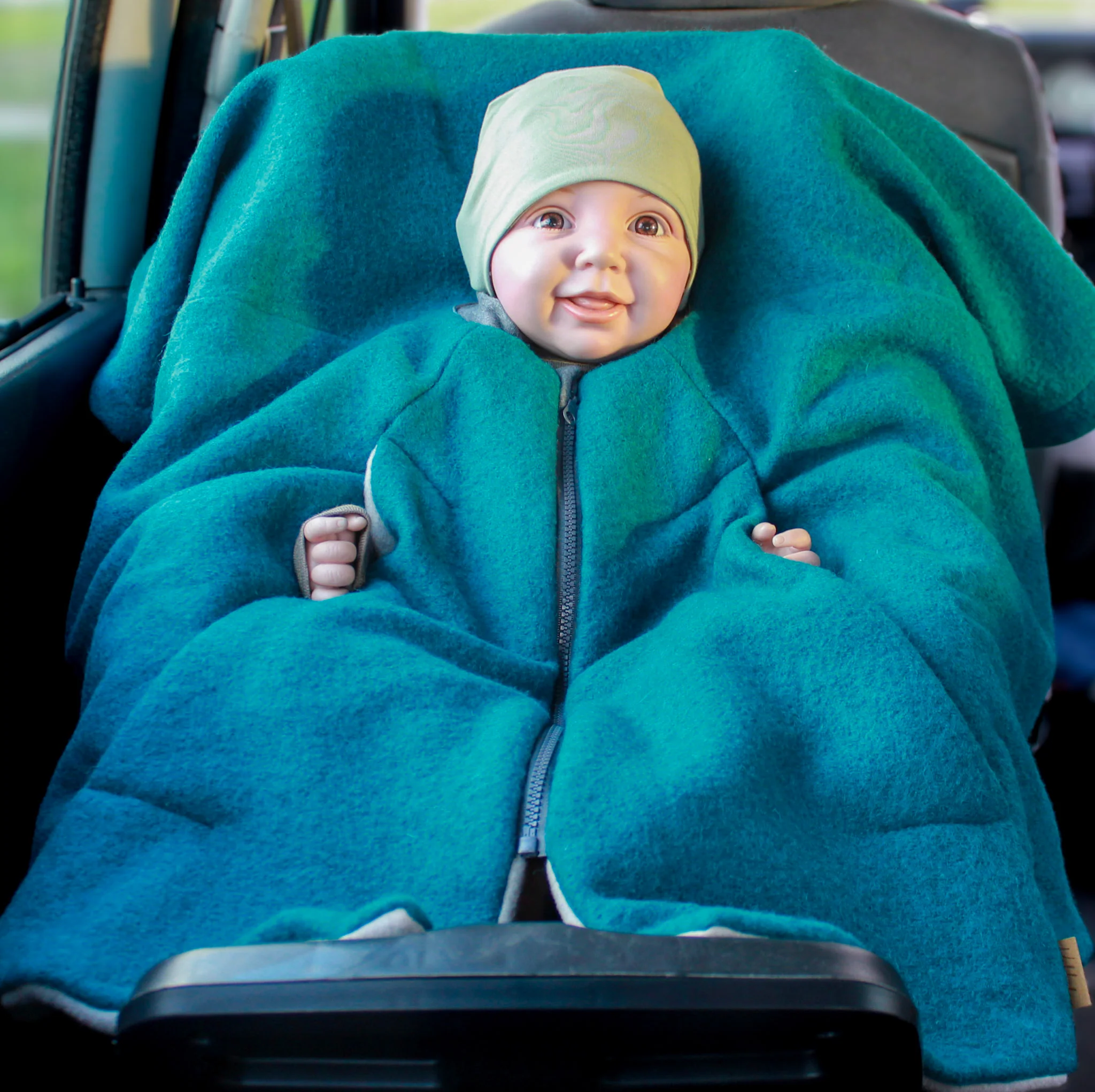 Kikkifax Wollwalk Kinderponchos Türkis